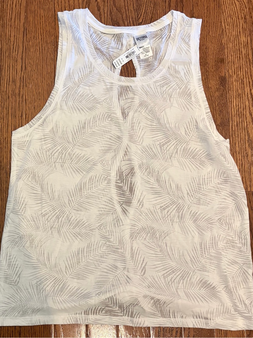 Victoria Sport tie back feathered tank